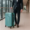 TraveLux Pro közepes bőrönd keményfedeles 68x45x25 cm lagúnakék