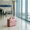 TraveLux Urban kisméretű kézi bőrönd keményfedeles 28x36x16 cm lazacrózsaszín
