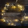 Elemes LED fénykoszorú átlátszó kábellel, meleg fehér színben